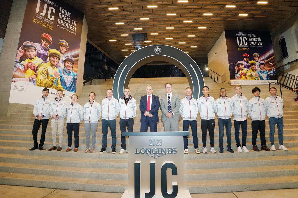 Hong Kong Jockey Club Chief Executive Officer Mr Winfried Engelbrecht-Bresges poses a group photo with the LONGINES International Jockeys’ Championship participating jockeys. (HKJC Photo)