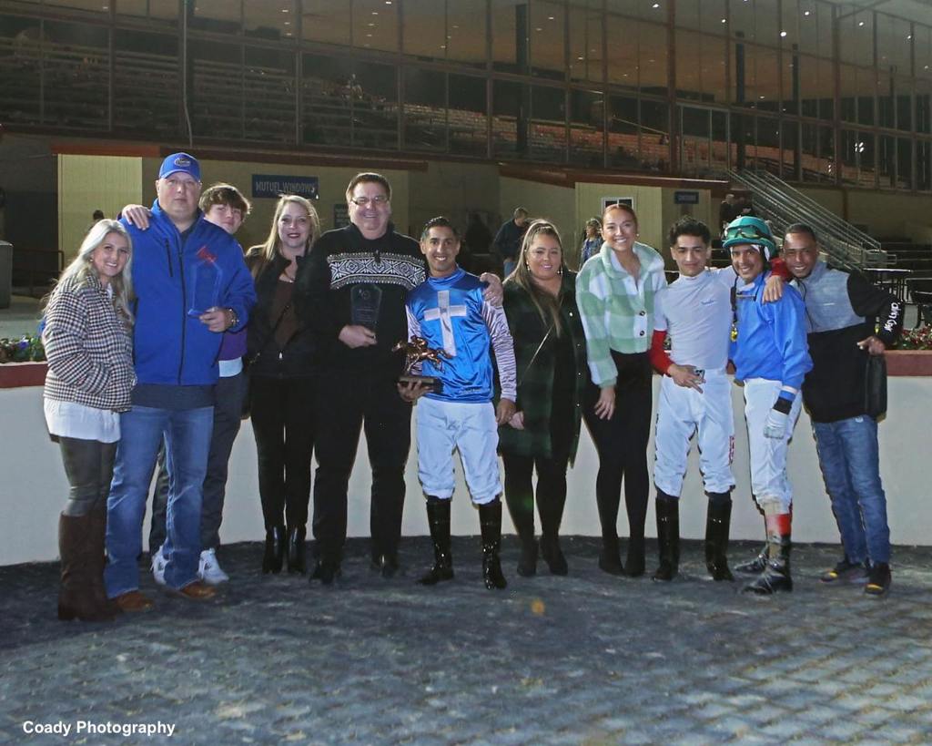 Trainer Anthony Farrior (second from left), owner Rick Burnsworth and jockey Arnaldo Bocachica were honored in December as the 2023, win champions at Charles Town. (Coady Photography)