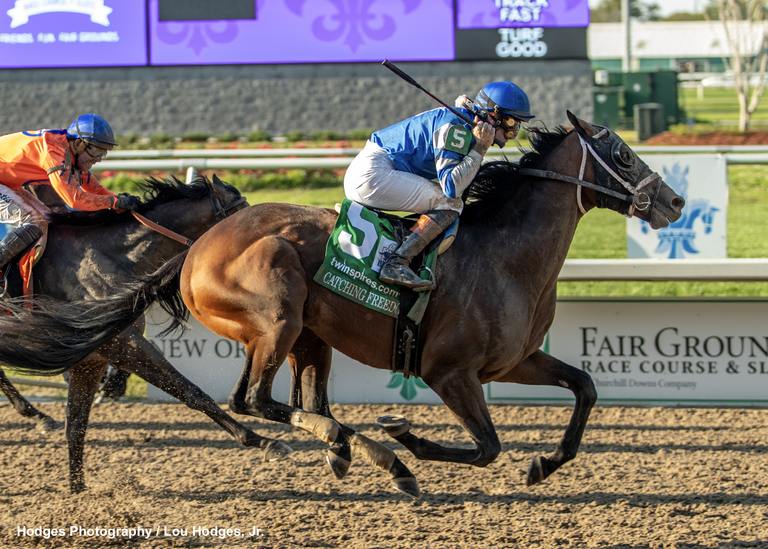 Catching Freedom outkicked for the victory and a spot in the Kentucky Derby. (Hodges Photography/Lou Hodges Jr.)