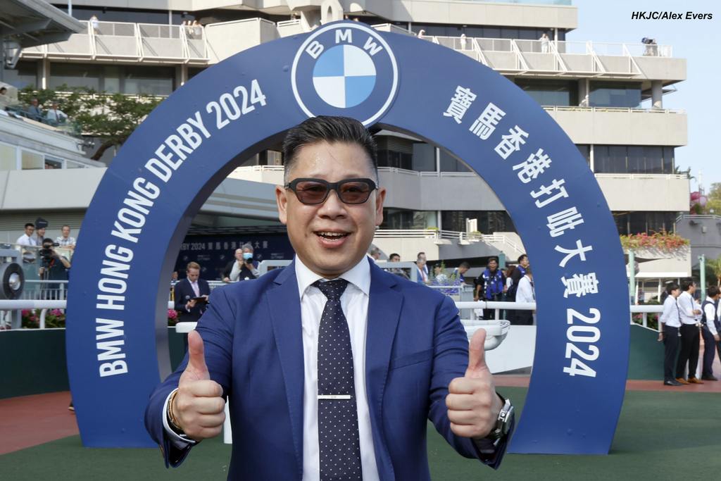 Dennis Yip celebrates BMW Hong Kong Derby victory. (HKJC/Alex Evers)