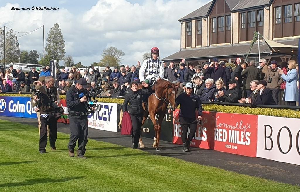 Team Banbridge walking to collect their trophy. (Breandán Ó hUallacháin photo)