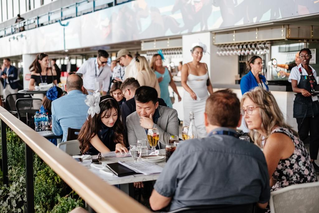 Guests on the Stella Artois Patio at The King's Plate in 2023 (Woodbine Photo)