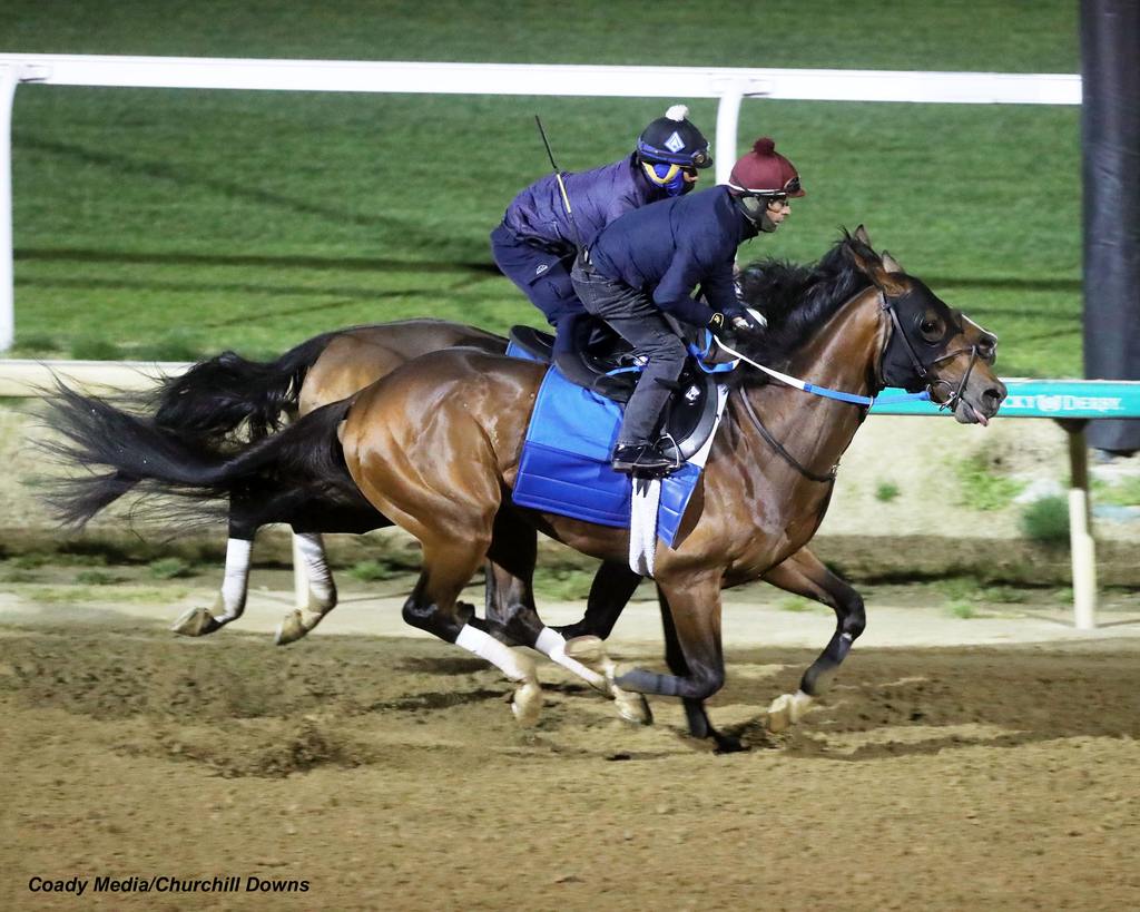 Track Phantom (outside) with Gatlinburg galloped about 1 ½ miles  under exercise rider Roberto Howell. (Coady Media/Churchill Downs)