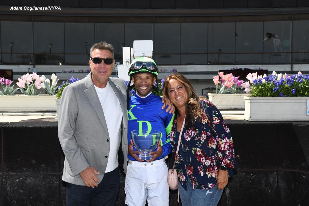 Kendrick Carmouch with the owners at KimDon Racing. (Adam Coglianese)