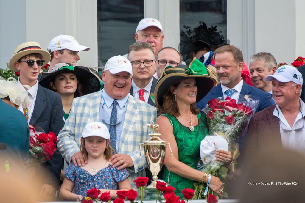 Trainer Kenny McPeek and family celebrate Mystic Dan's victory. (Jenny Doyle/Past The Wire)