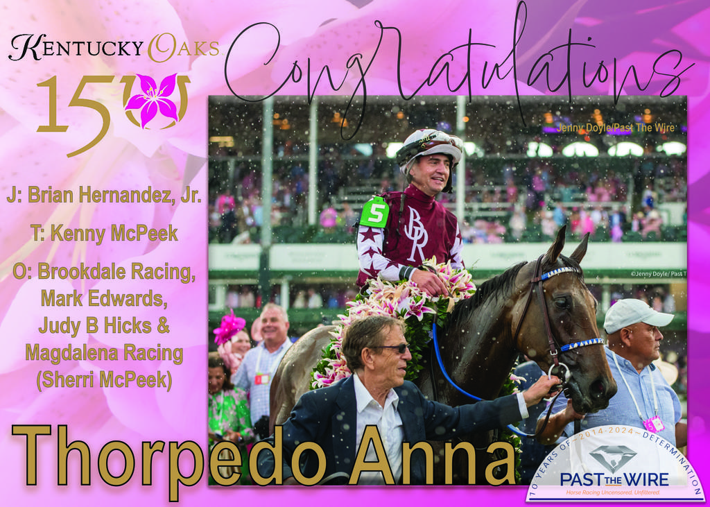 Brian Hernandez, Jr., beaming aboard Thorpedo Anna after their Oaks victory. (Jenny Doyle/Past The Wire)