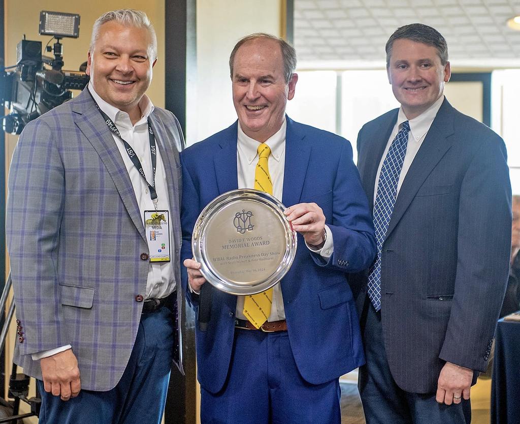 Really neat being a part of the WBAL NewsRadio 1090 and FM 101.5 team honored with the David F. Woods Award at today’s Preakness Stakes Alibi Breakfast! Cool to be recognized along with my colleague and co-host Pete Medhurst for our 3 hour live trackside show from last year’s Middle Jewel of Racing’s Triple Crown. The award presented by the Maryland Jockey Club recognizes the best Preakness story from the previous year. And thanks to WBAL-TV 11/WBAL Radio President & General Manager Dan Joerres (left) and WBAL Radio Director of News & Programming Jeff Wade (right) for celebrating the accomplishment with us today and for all their encouragement and commitment to covering this great event and the Maryland horse racing industry! (Photo courtesy of Scott Wykoff)