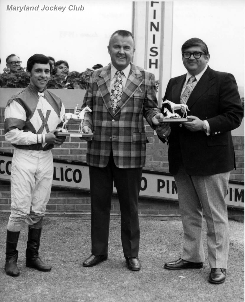 Vincent Bracciale (left)  with the trophy in 1987 along side of Chick Lang (center). (Maryland Jockey Club)