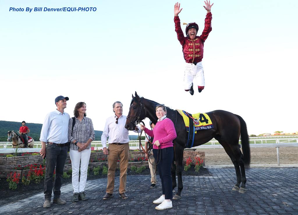 Looking like a soldier in his silks, Dettori gets amplitude off of First World War. (Bill Denver/EQUI-PHOTO)