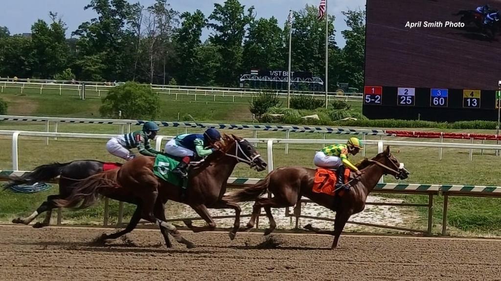 Race 6-#7 Bourbon N Lace (Trainer Anthony Pecoraro, Jaime Rodriquez up) gets to the wire first. (April Smith Photo)
