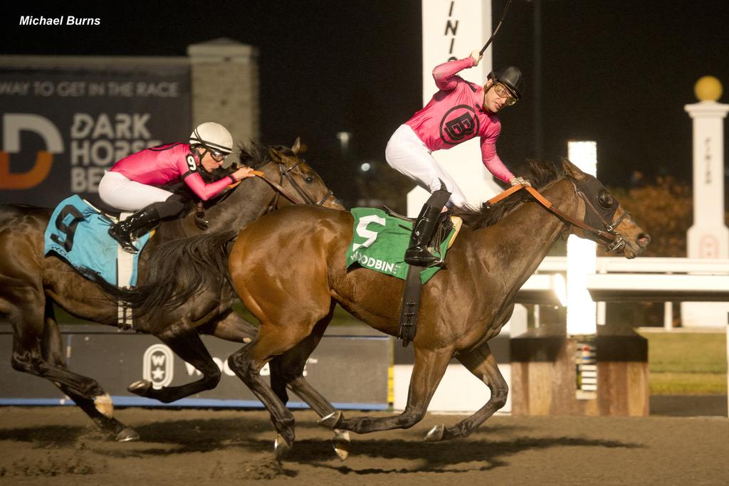 Candy Overload and jockey Sahin Civaci winning the Kennedy Road Stakes (G2) in 2022 (Michael Burns Photo)